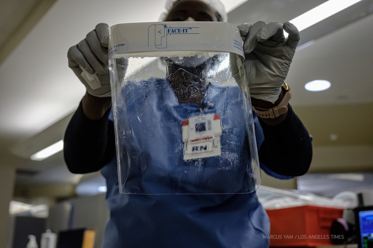Registered nurse Linda Isidienu displays her visor, which has been used and cleaned repeatedly as medical staff try to preserve protective gear at the medical center.  #coronavirus  #pandemic  https://www.latimes.com/california/story/2020-04-15/on-the-front-lines-of-the-covid-19-pandemic