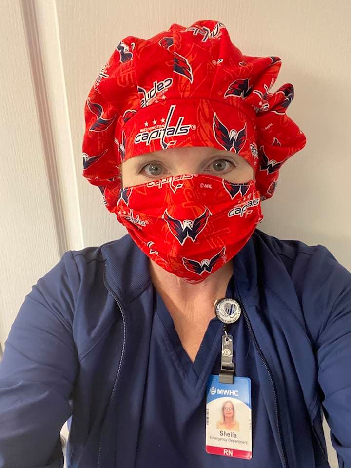 USNavyMama's tweet photo. Hey @Capitals  not exactly the way I thought I would be "rocking the red" this April. Super appreciative of @LynnOvermann and @_McKenzieMiller for the masks " https://t.co/E3o8HH3NaU