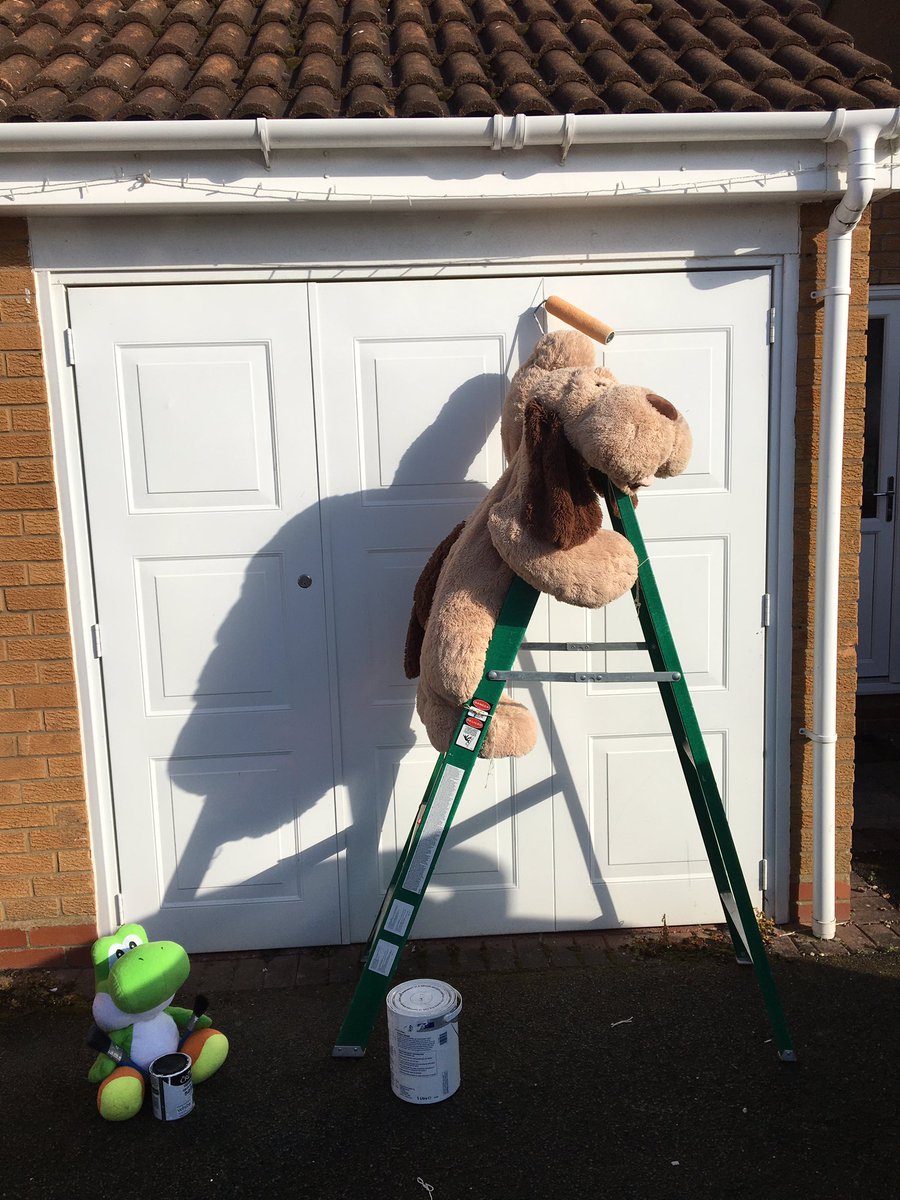 And today Dfer is helping out by re-painting the garage door. #teddywatch