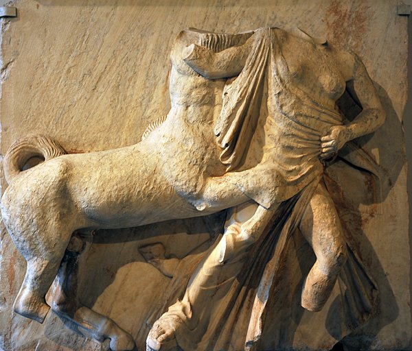 VardasGeorge's tweet photo. In the #Louvre in #Paris marble fragments of the #Parthenon Sculptures taken by the French from #Athens include the sublime procession of the Ergastines, a male head from the north #frieze and a centaur and lapith in mortal combat from a #metope #MuseumsUnlocked @profdanhicks https://t.co/pXbjvUHgQ9