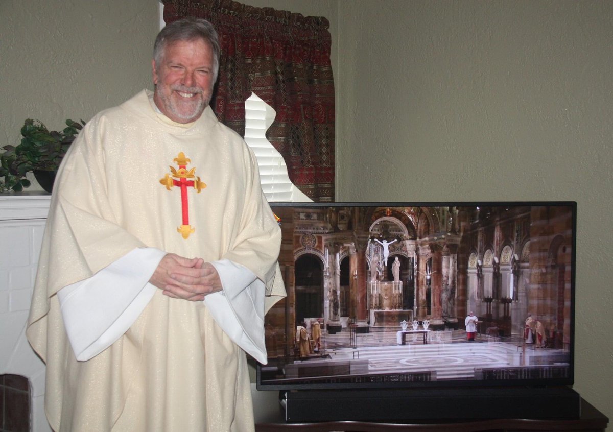 revkevsch's tweet photo. Did Chrism Mass this morning. The pews in my living room are awesome. #HRStrong #HolyRedeemerWG https://t.co/3KCt3tZ1FA