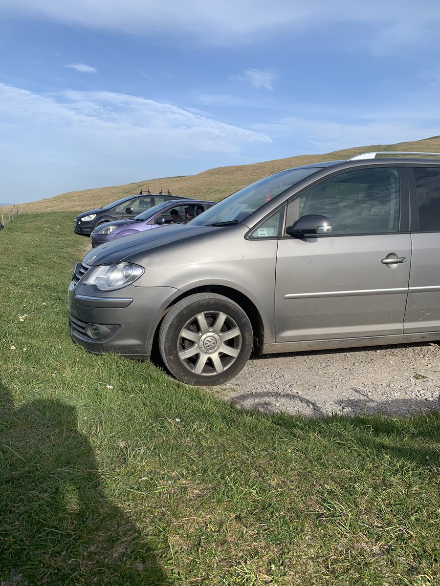 Charliecat74's tweet photo. @nationaltrust Can you maybe think about closing off your car parks??People aren’t listening. This is at White Horse Hill at Uffington. (I rode here by bike and I’m local 🚴‍♀️) #StayHomeSaveLives #protecttheNHS https://t.co/Qrt4n8B2Js
