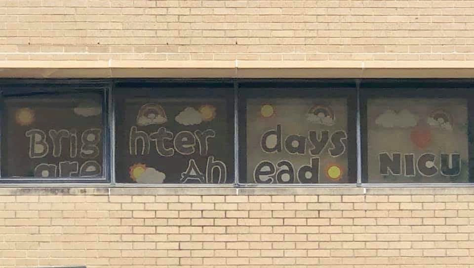 JPS_Health's tweet photo. Our super creative team members in the Neonatal Intensive Care Unit (NICU) used their windows to send a little love to their hardworking colleagues across the way in the Emergency Department and ICU.  #JPSteamwork #JPSpride https://t.co/qZT9HtTcQL