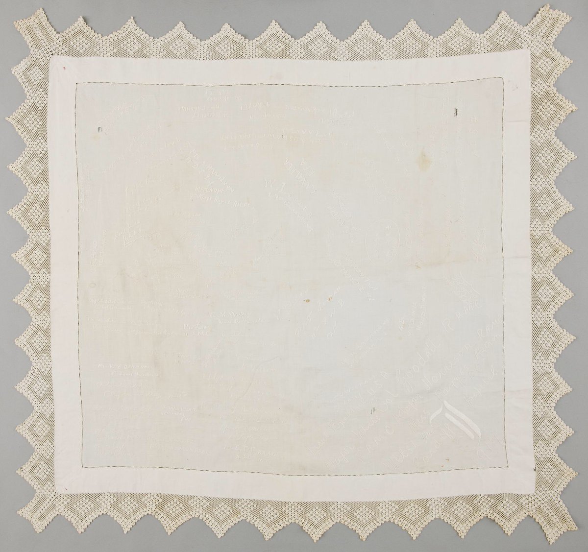 Look closely at the tablecloth and you'll see names embroidered in white thread across the entire surface.These are the signatures of a group of patients and staff at the Welsh Metropolitan War Hospital, Whitchurch, Cardiff in 1917. https://museum.wales/collections/online/object/56dbebdb-6fcd-3189-a50d-1f11d5e70f65/Table-cloth/?field0=with_images&value0=1&field1=string&value1=Whitchurch&field2=string&value2=Hospital&index=1