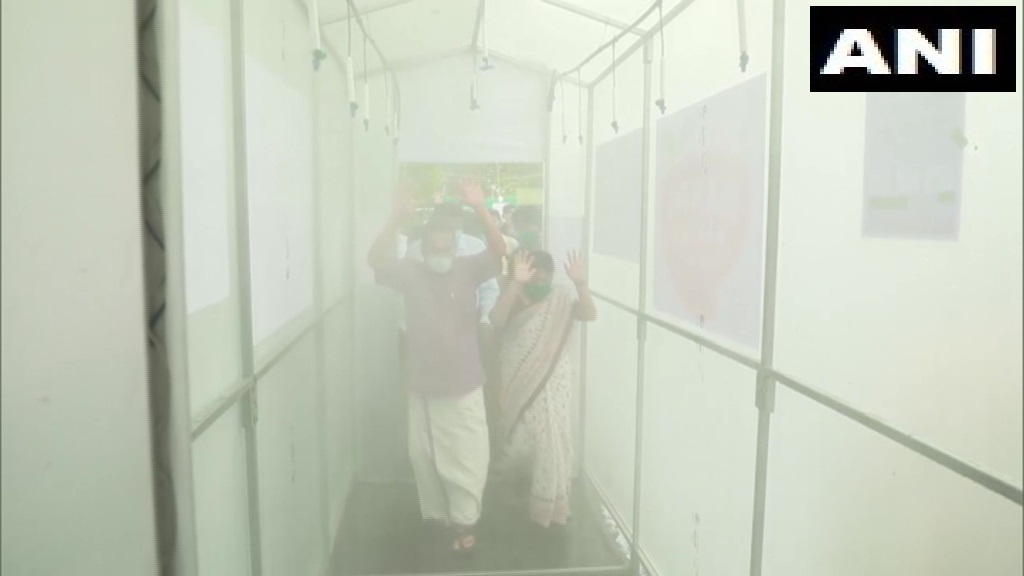 ANI's tweet photo. Kerala: A sanitization tunnel has been installed at the entrance of Thrissur General Hospital, amid #Coronavirus outbreak. https://t.co/j0BdL3bGbz