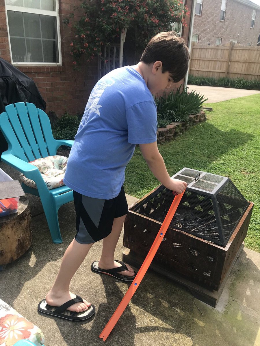 SiegelEagles's tweet photo. As part of their choice board this week, 5th graders were challenged to make a ramp and use toy cars and different surfaces to decide which way the car travels the farthest. Ian is using this beautiful day to get outside and work on his experiment.  Way to go Ian! https://t.co/l7wXSHyZlL