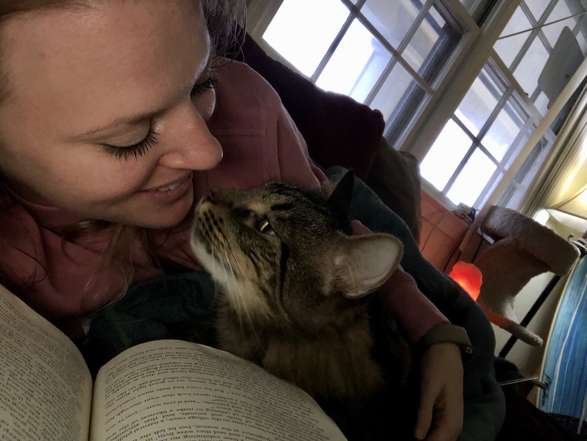 Virtual Spirit Week: Santana is enjoying some reading time with his favorite momma reading her favorite book! #baysidebulldog #VBAlwaysLearning