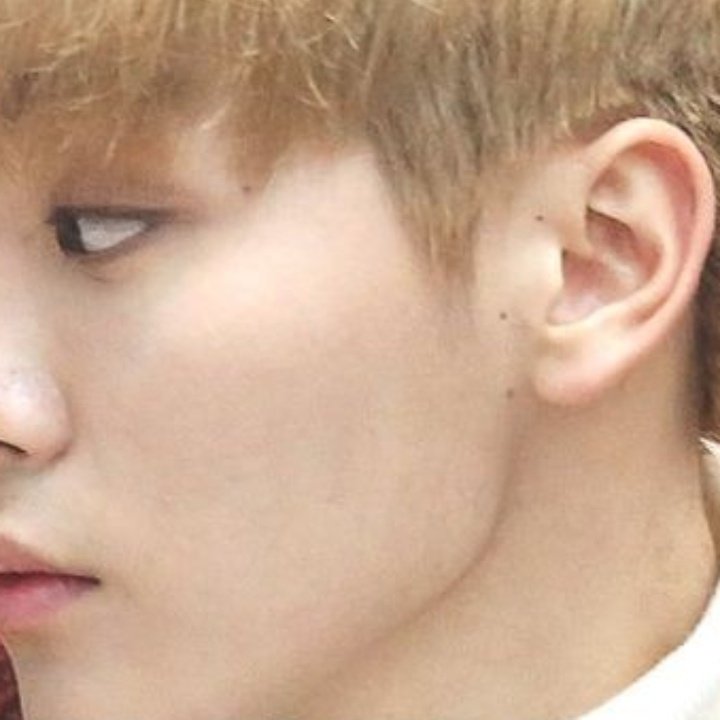 – everybody falls in love with seungkwan's moles. from the three moles at his ear, his mole beside and under his eye, and his mole on his lovely hands