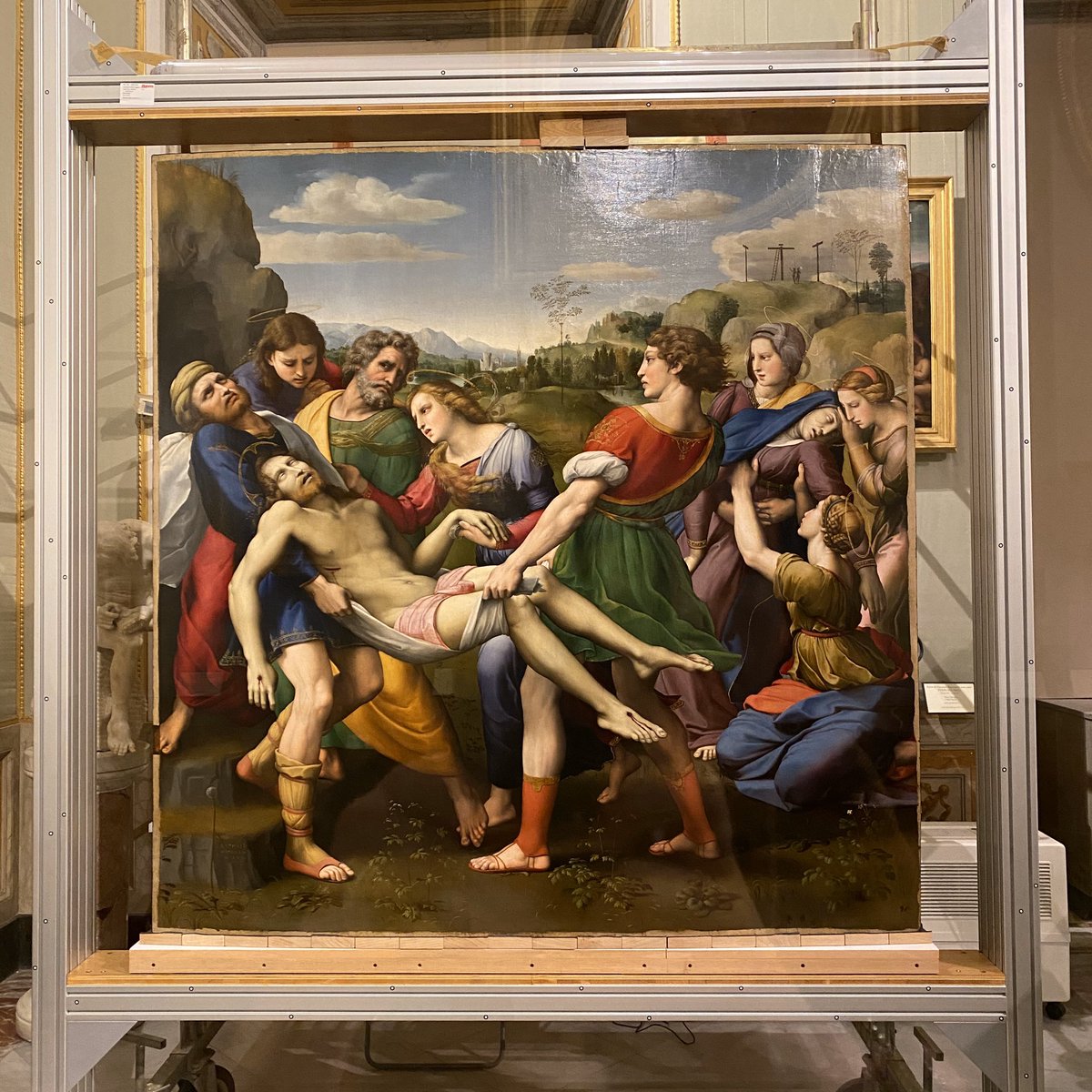understandrome's tweet photo. The Deposition from Baglioni altarpiece painted for San Francesco al Prato at Perugia, 1507. Stolen to order by Scipione Borghese a century later, the original was replaced with a copy by Cavaliere d’Arpino. Photo: 5 March at Borghese, soon before it was to be rehung #Raphael500 https://t.co/UGh35MsTZr