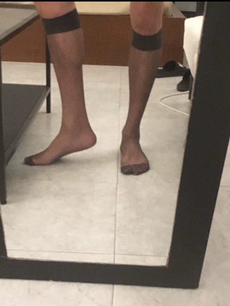 Wearing ultra sheer socks on grey. Waiting for a cock