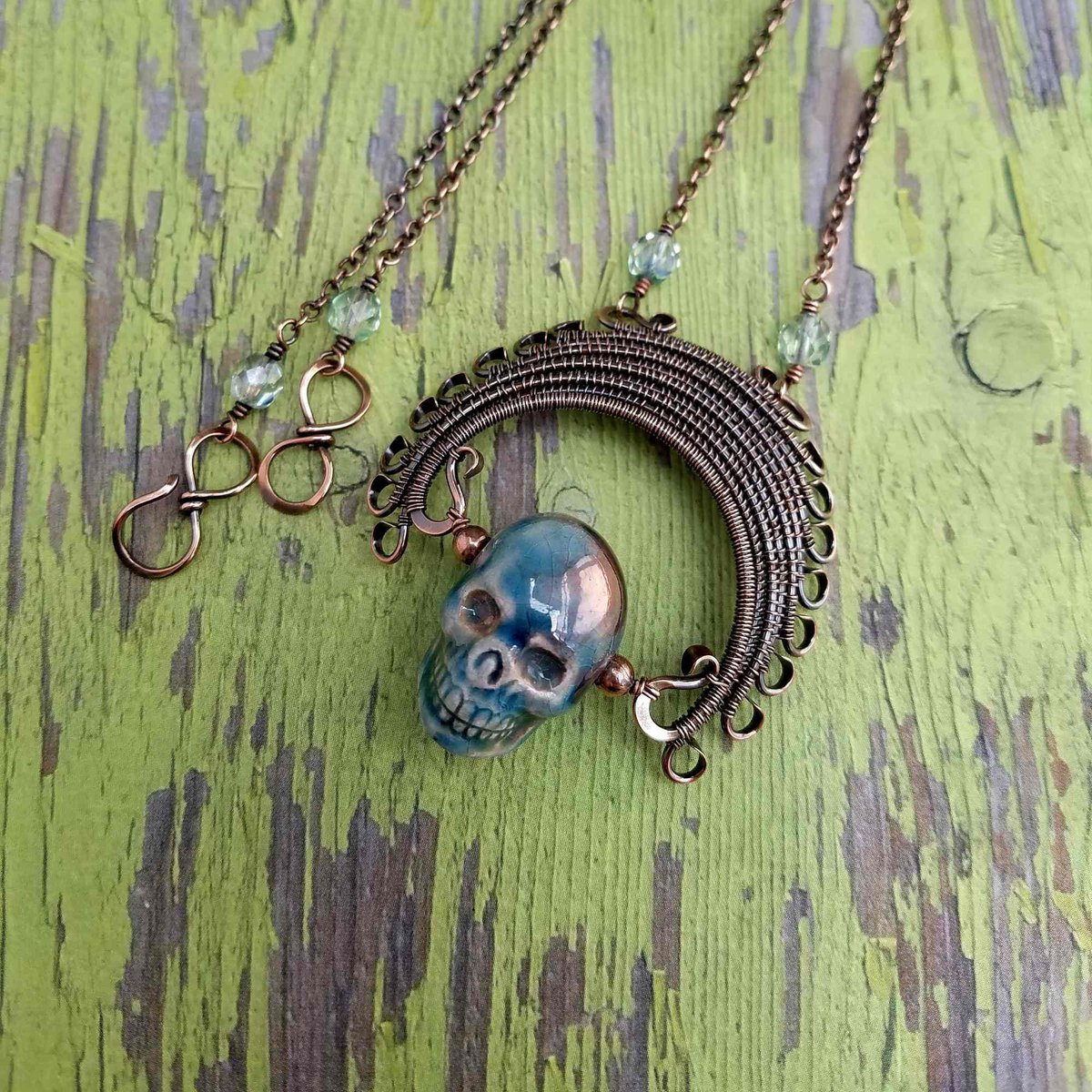 door44studios's tweet photo. The Door 44 Ancestor Pendant featuring a Peruvian ceramic skull and a handwoven copper headdress https://t.co/lECt6dO31k #Door44Studios #MyNewTag #Etsy #Door44Jewelry https://t.co/FVtzw9H2aC