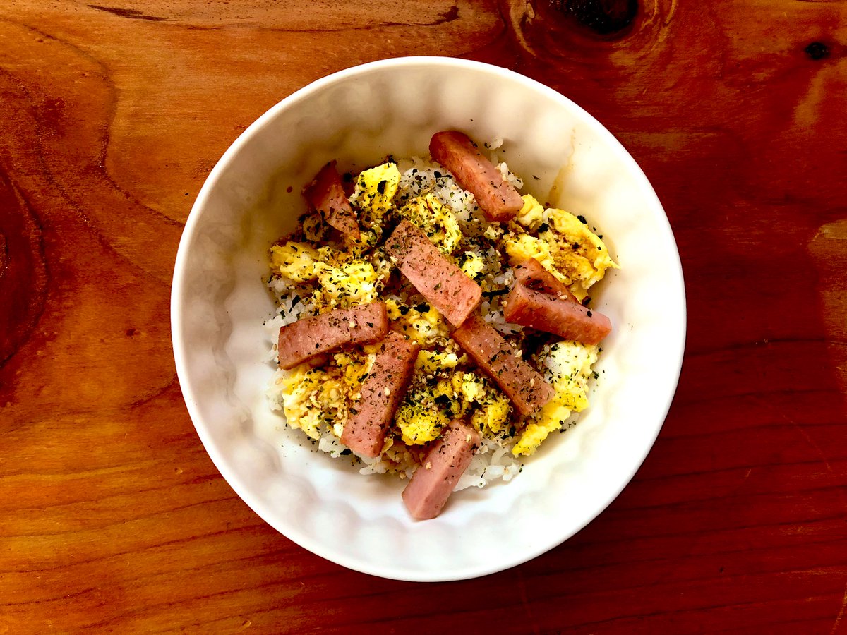 Hawaiian inspired breakfast: rice with eggs and spam. Sweet soy and furikake.