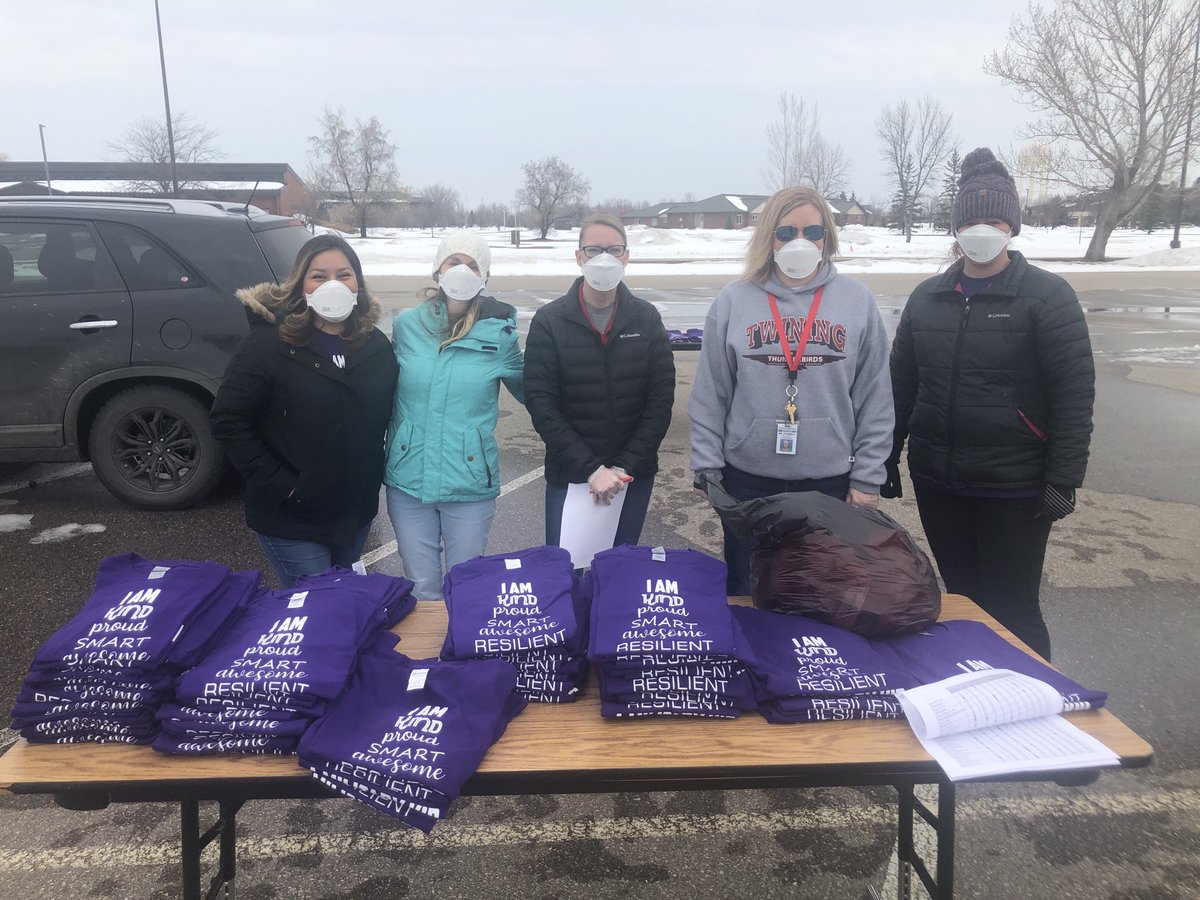 Celebrating Month of the Military Child with T-shirts for the students.