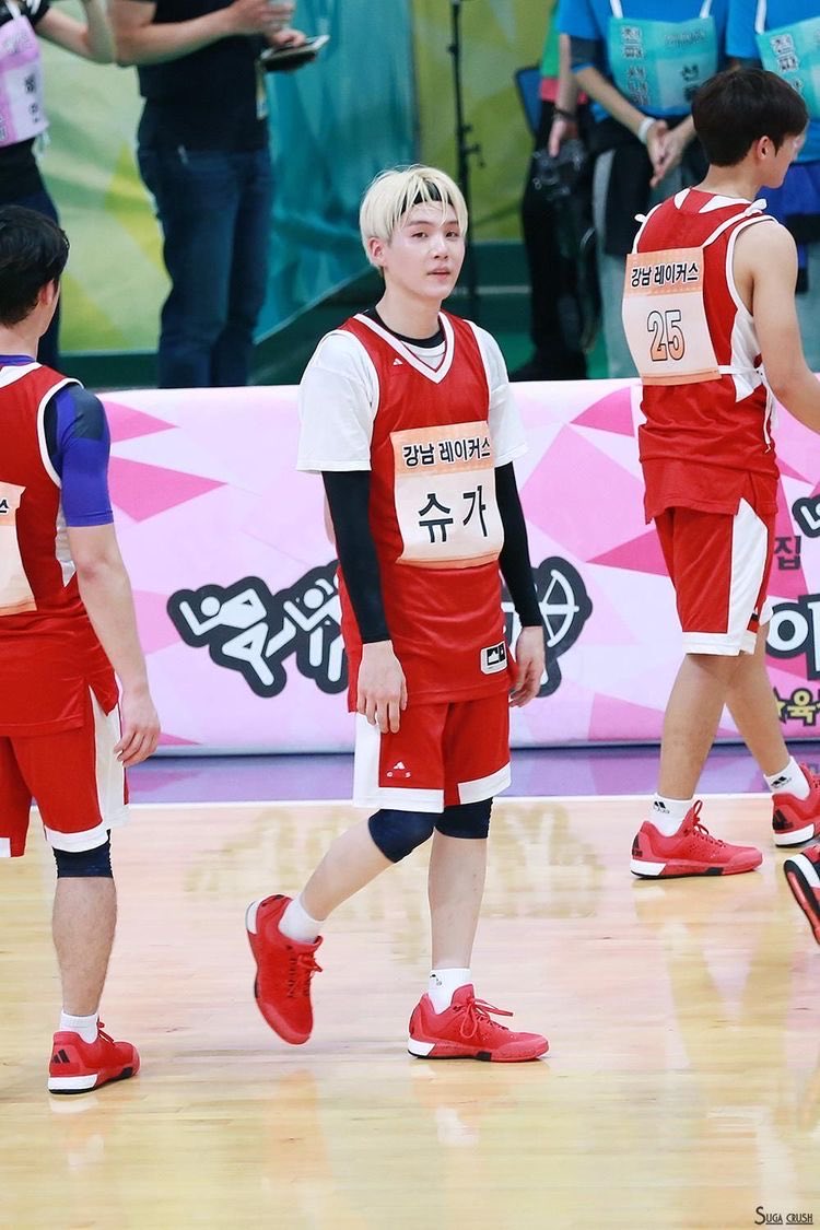 Cheering him at his basketball game