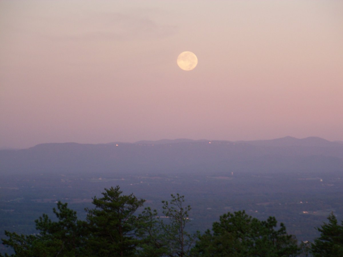 NCparks's tweet photo. Super Moon anyone? Plan on stepping outside and see tonight's full moon.  In N.C. it will be at 98.5% illumination at 7:23 tonight, but start earlier! It's the largest full moon of the year! (A pretty shot from Pilot Mountain State Park a few years ago.) #supermoon #ncstateparks https://t.co/c1azHnjdsy