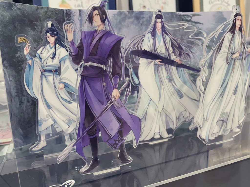 MDZS donghua standees that come with their name tags and sect motif bases. Also a really, really nice book!