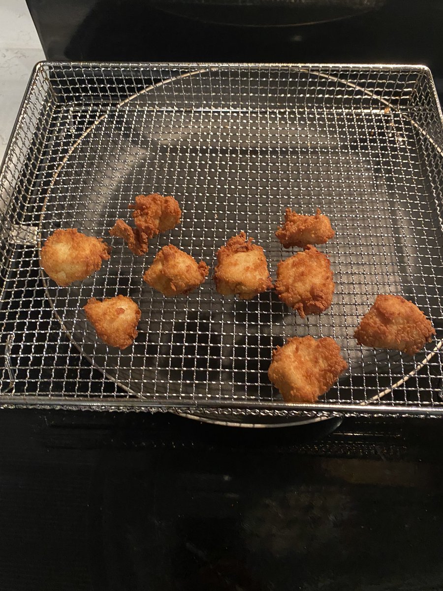 I would make the first ever (to my knowledge) Nugget Egg N Cheese sandwich and I would put Chick Fil a sauce on it. Let that sink in. Crazy, right? FIRST I tossed 9 nuggets in the air fryer for 5 minutes to reheat.