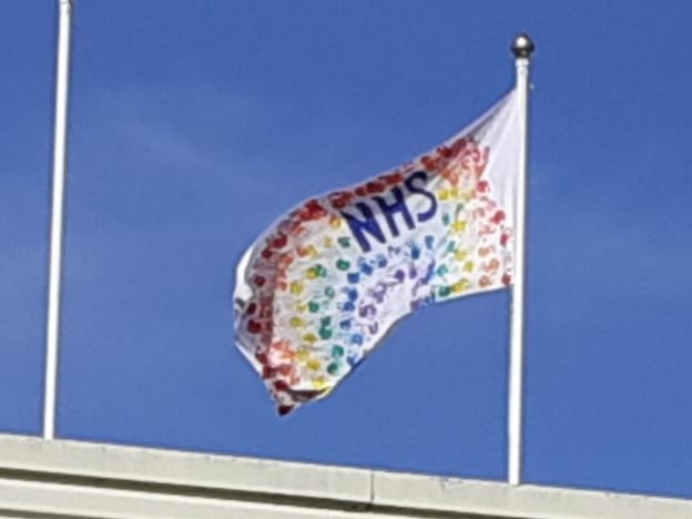 DTBedwasHigh's tweet photo. The flag flying high above @HubBedwas made by the pupils attending the hub. #StayHomeSaveLives #NHSrainbow https://t.co/Q98EjTdJqc