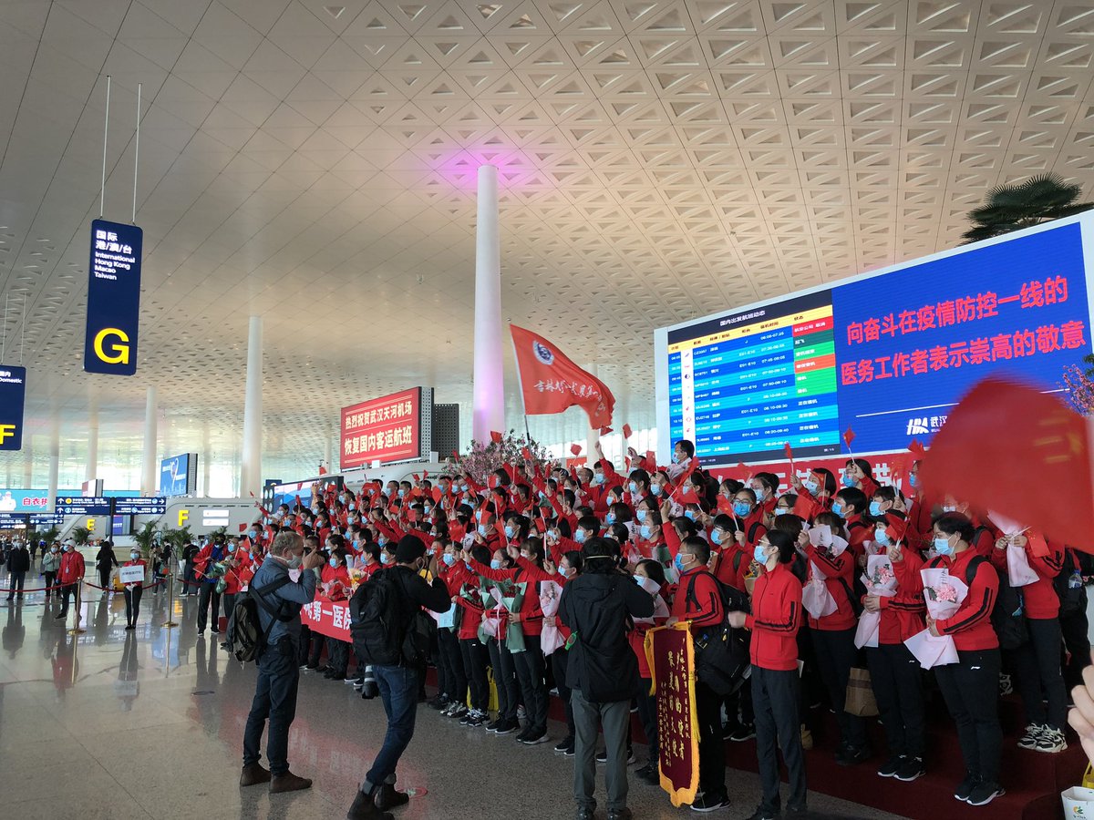 We’re at the airport now and there’s a farewell ceremony going on for medical staff from Jilin University First Hospital. It’s a lot of stirring music and flag waving.