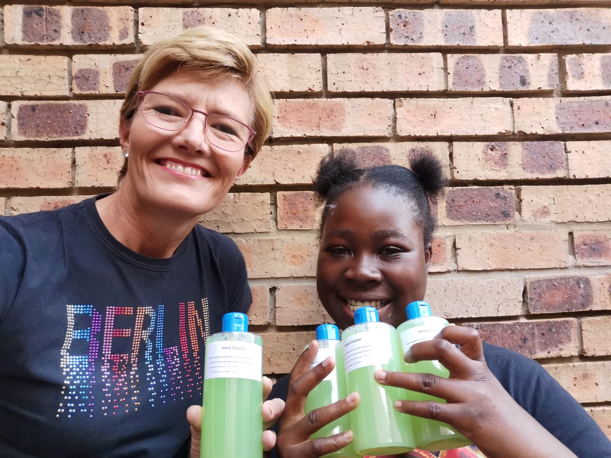 TCSEdSystem's tweet photo. Our International Liaison Officer, Kari Prince, in South Africa &amp; her family traveled to Alexandra Township, home to one million poverty-stricken people, to make 200 bottles of hand cleaner, for our partner organization #RaysofHope to hand out to families. #Covid19 https://t.co/GRyqOJEqgA