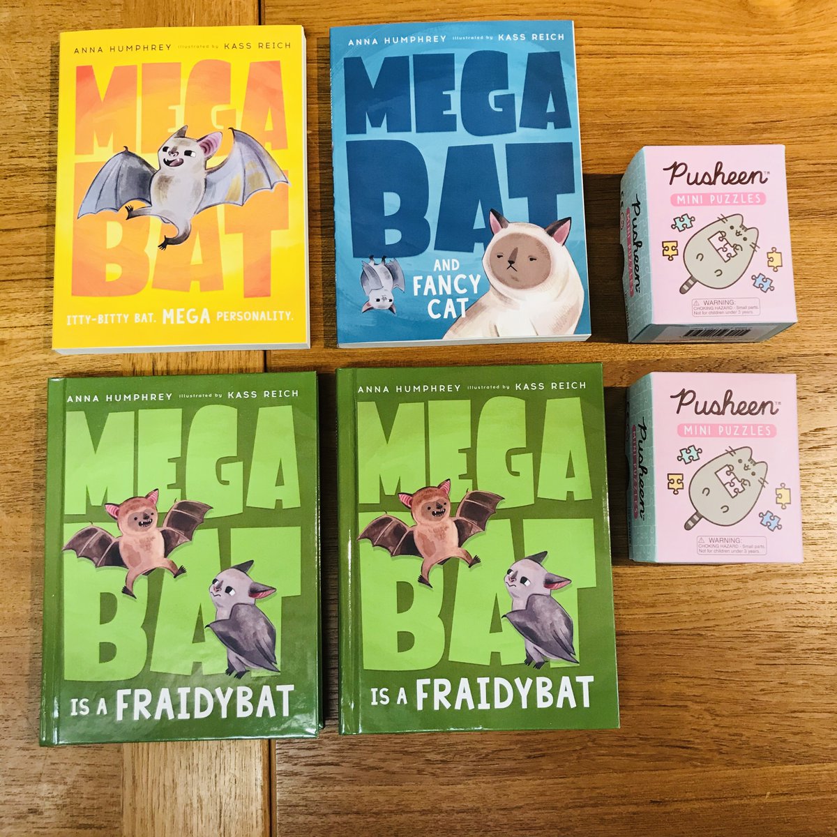 New in first chapter:MEGABAT IS FRAIDYBAT by  @Anna_Humphrey, illus by Kass Reich! Plus the first two MEGABAT books out in paperback!Also some super cute Pusheen mini puzzles illustrated by Claire Belton!