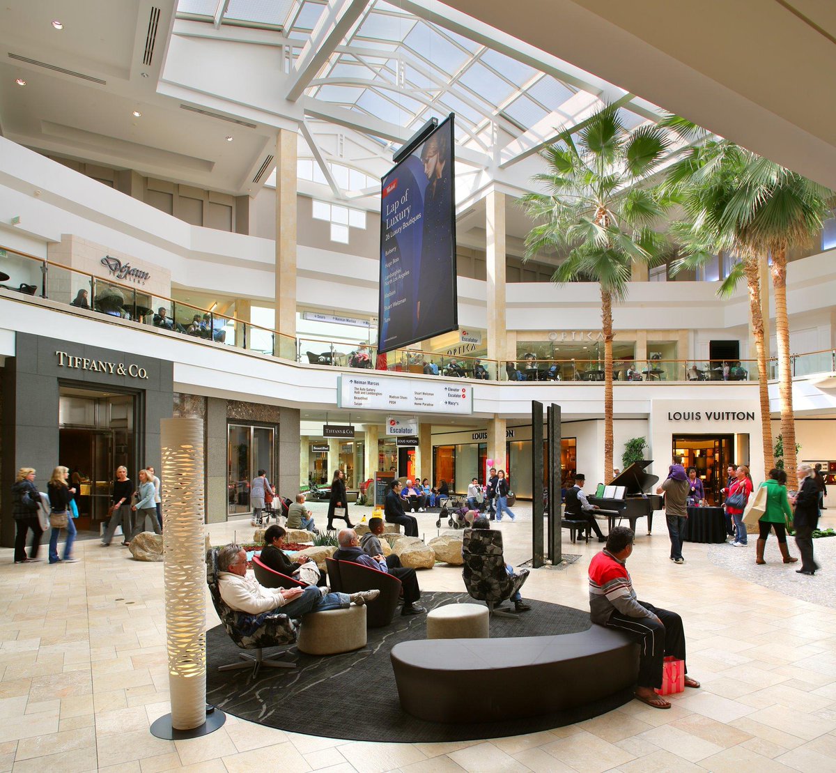 If you went to any Westfield Mall in Jan 2020, you'd walk through a section that has LV, Prada, Gucci, Tory Burch, Swarovski, Michael Kors, Kate Spade and more. They're all right next to each other because they all occupy their own niche of "achievement" or "status" purchases.