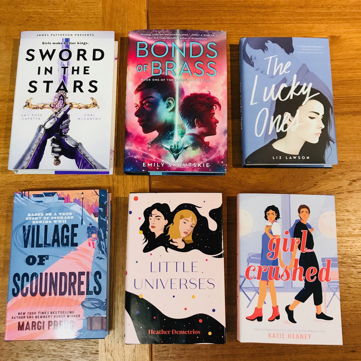 Young adult (and one teen)!SWORD IN THE STARS by  @CoriMcCarthy &  @AmyRoseCapetta!VILLAGE OF SCOUNDRELS by  @MargiPreus!BONDS OF BRASS by  @skrutskie!LITTLE UNIVERSES by  @HDemetrios!THE LUCKY ONES by  @LzLwsn!GIRL CRUSHED by Katie Heaney!