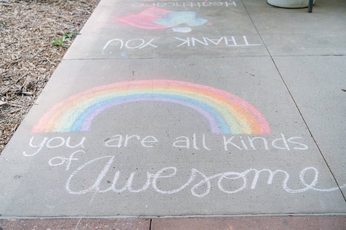 UTMDAnderson's tweet photo. These colorful chalk art messages greeted our employees today. Thank you to our #healthcareheroes for your commitment to protecting our patients and each other from #COVID19. #WorldHealthDay #endcancer https://t.co/ew9bDTA1pb