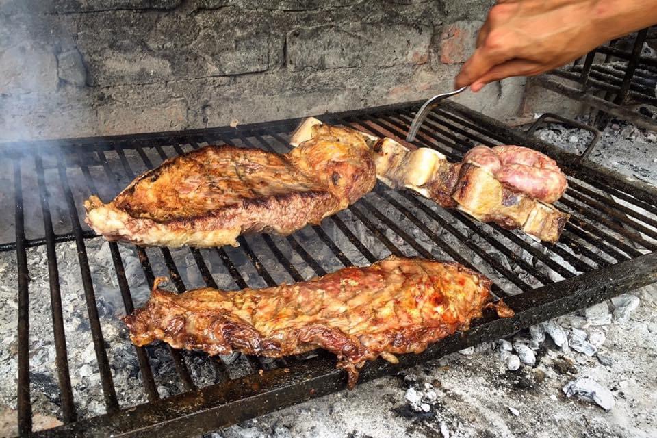 Asado is made from special cuts of Argentine beef, generously drizzled with fine salt and grilled in low fire over charcoal from a specific wood. The cooking has to be precise —controlled temperature, correct distance from the charcoal, flipping at the right moment, among others.