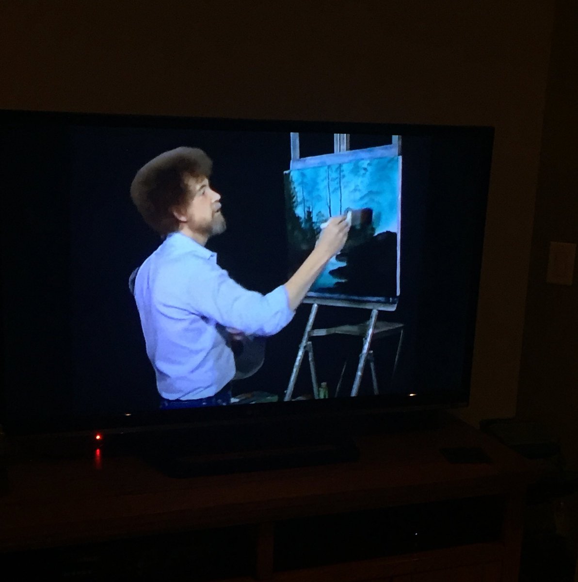 erin_a_smith's tweet photo. Well this is a happy, feel good, stress reducing show to watch these days. Highly recommend scheduling Bob Ross into your life right now. https://t.co/LoJbMFyJB8