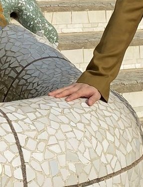 his fingers; a thread