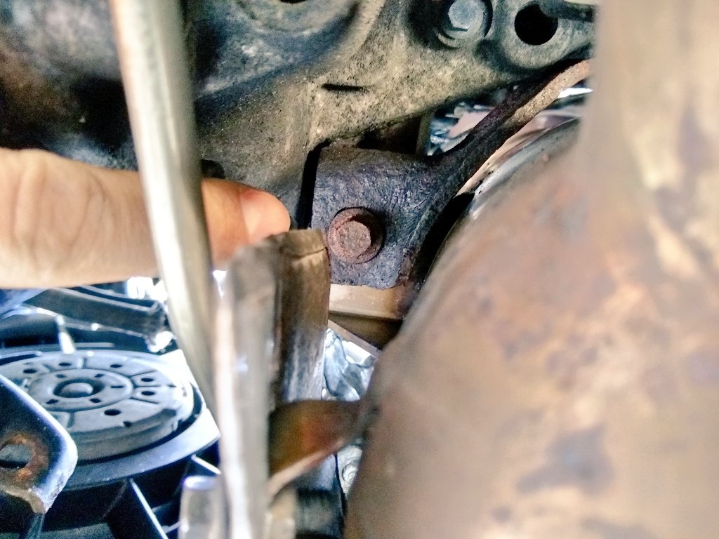 Remove the heat shields, and you will have access to the clamp that mounts the DPF to the turbo. Loosen it. Then remove the fasteners from the other mounting points.