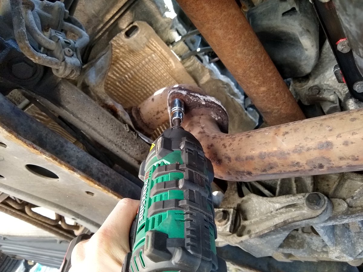 Remove the heat shields, and you will have access to the clamp that mounts the DPF to the turbo. Loosen it. Then remove the fasteners from the other mounting points.