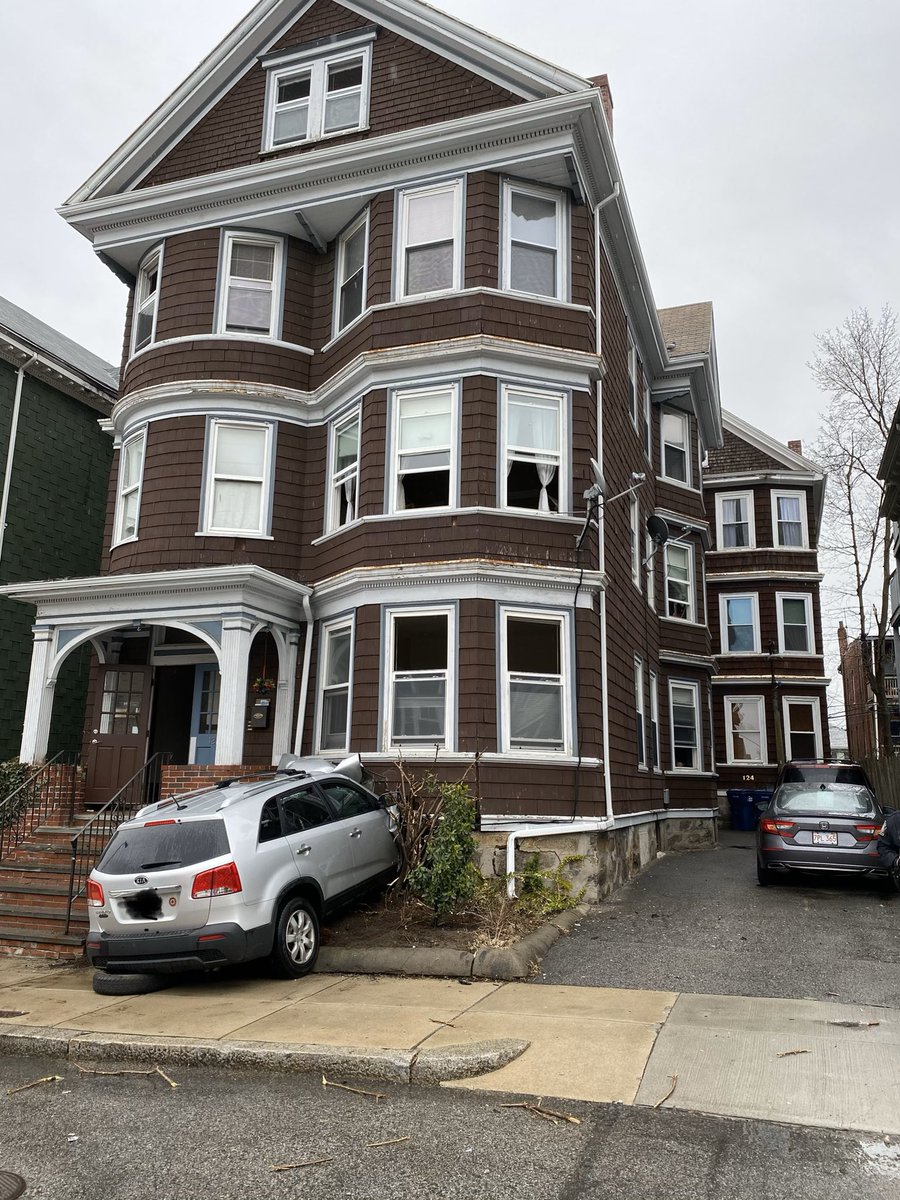 At approximately 0945 , There was an car into a multi family dwelling at 122 Calumet St. The