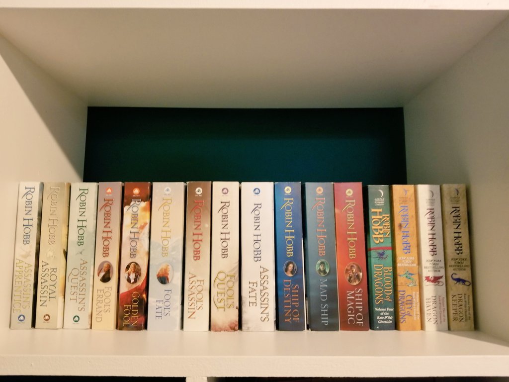 DAY 19: "Realm of the Elderlings" by Robin Hobb.Is it cheating to include five trilogies?! No-one cares. The world has gone crazy anyway. Might as well escape your living room into this beautifully crafted fantasy world. Just take it one trilogy at a time! #lockdownlibrary