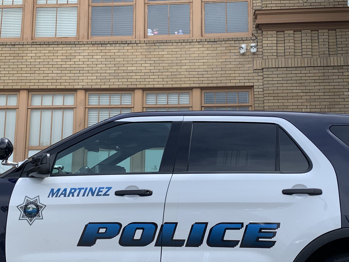 MartinezPDinCA's tweet photo. If you’re out for a walk with your children, practicing safe social distancing, see if you can spot the bears. Our Dispatch team thought it would be fun and wanted to participate in the #bearhunt2020 #InThisTogether #MartinezStrong https://t.co/LMLjknuArL