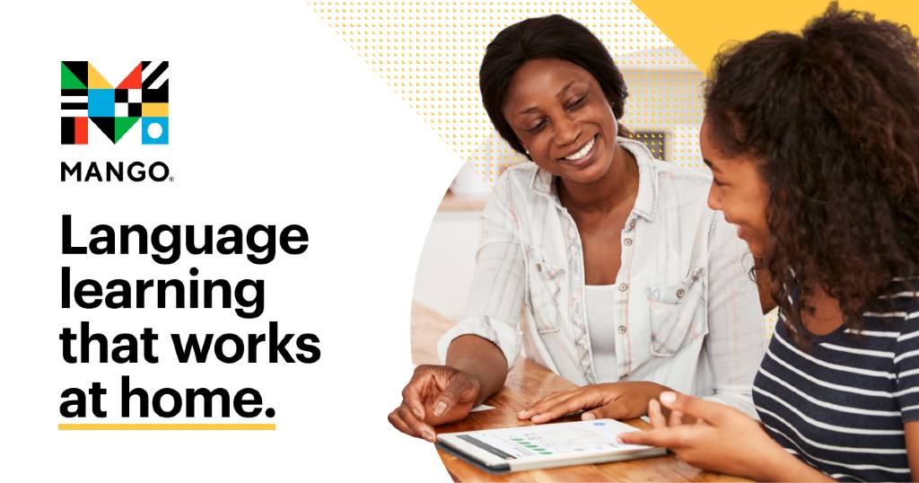 a woman sitting next to a teen sitting with a tablet