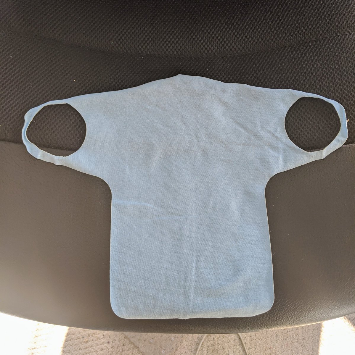 LaserMistress's tweet photo. Day 11 of 30 days of lasercutting. Simple mask from an old t-shirt. Cut in ~10 seconds. Design from the #Glowforge forums. You fold the extra part up and put material between. Gonna put a flexible LED matrix in there. #laserartist #womeninhardware https://t.co/mNXBpX5CEi