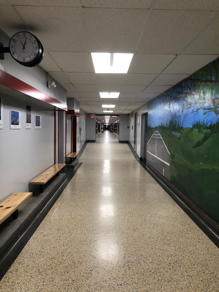 MsPTeachesMath's tweet photo. 11 am on a school day. This brought me to tears. Popped in to get some tech, and was overcome with emotion. I miss hearing the laughter, the conversations, the coach whistles coming from the gym. I miss each and every kid that should be in this hallway at 11 am on a school day. https://t.co/ec6sL00HYR