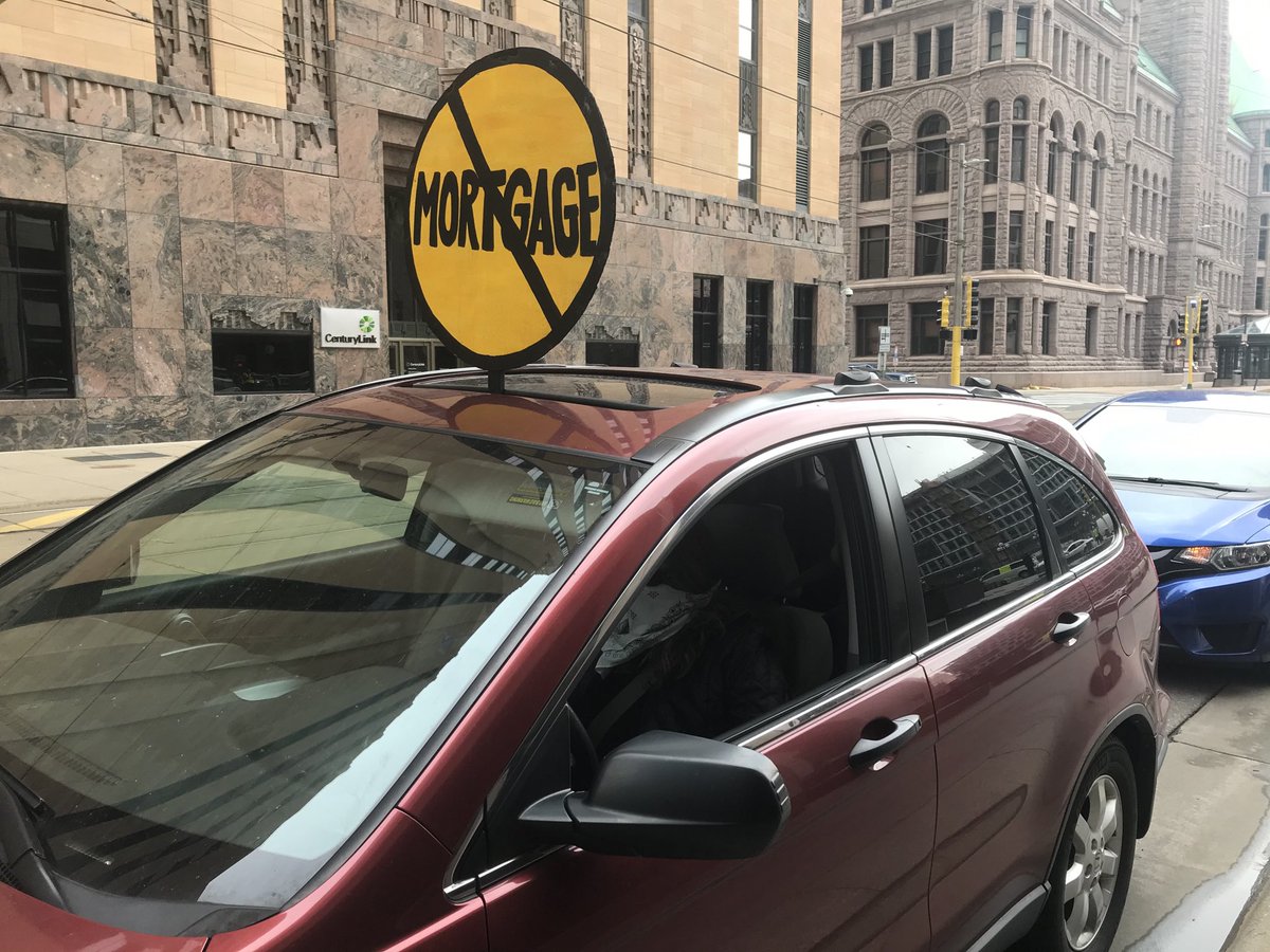 randyfurst's tweet photo. Protesters in sign plastered cars circled US Bank Plaza in Minneapolis today, Wednesday, calling for a rent and mortgage moratorium during the pandemic. https://t.co/EstuUO1zaB