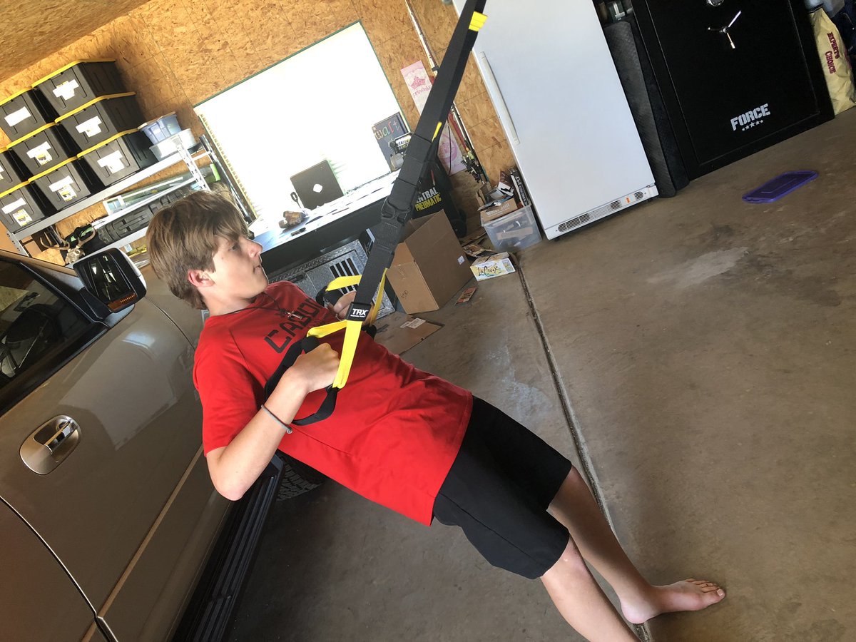 LindseyWing3's tweet photo. @CanyonJHBoys Walt doing a little TRX today! Row & Biceps! #workinghard #missingtheeagles #gettingsweaty https://t.co/xX2smqL6Pf