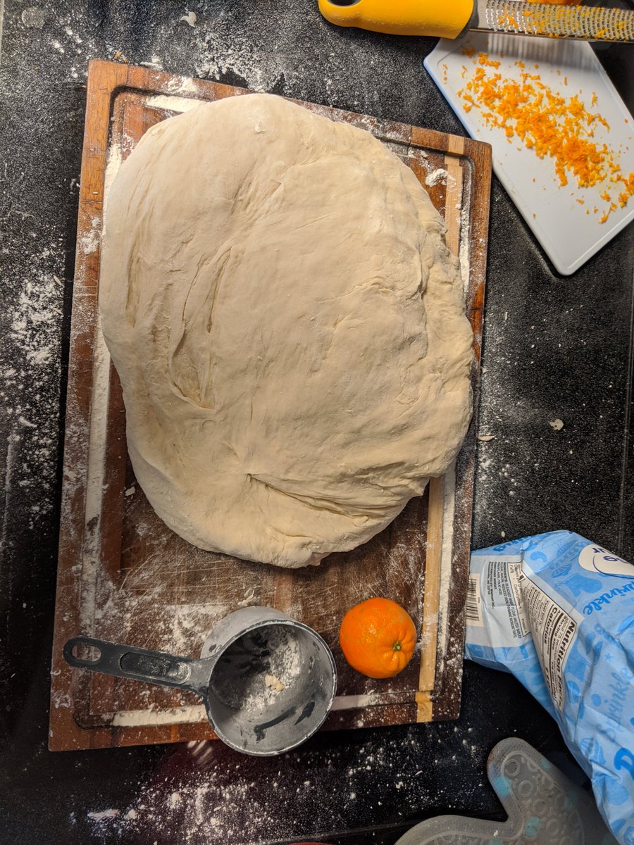 Next up, I have to knead this. I wasn't quite sure how yet, but I dumped it out on my cutting board and quickly found out I needed 2 cutting boards just to effectively knead this monster. This picture really doesn't do her justice. So just for kicks I decided to weigh her.