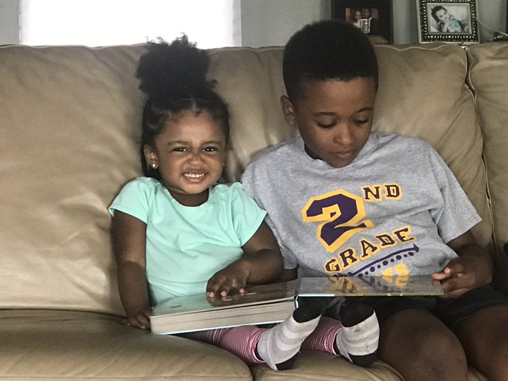 #WhatYaReadingWednesday Big Bro is taking time to read to little sis! @pleasantgrovees #PokeADot it’s her fav book! #SpartanSpiritWeek
