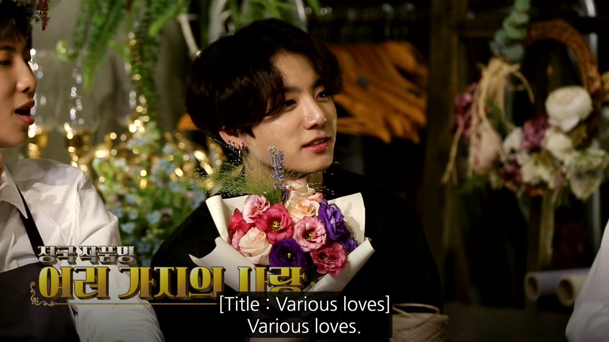 jungkook's bouquet- bi pride flag colours? "various loves"? inch resting - what is with this boy and eustomas- THERE ARE OTHER FLOWERS JEON JUNGKOOK- good shape for a bridal bouquet- minus the lilac and that oNE PIECE OF GREEN20/10 bi bouquet. a biquet™