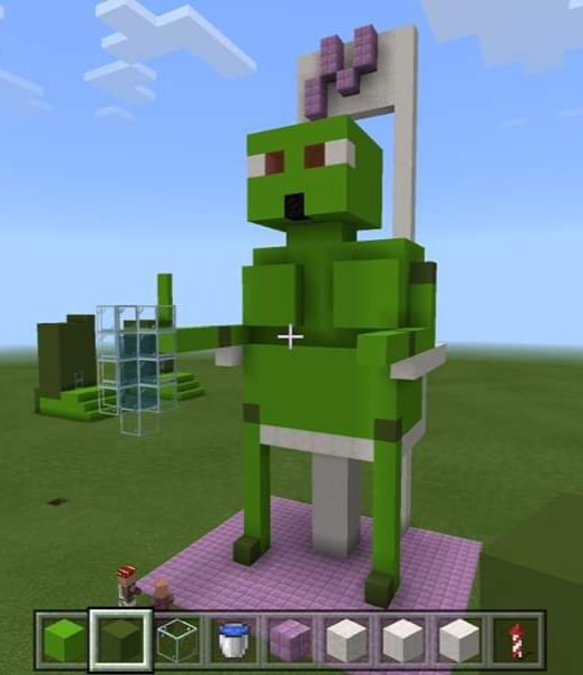 5yo's  #Minecraft creations are getting more impressive AND more batshit! This is a robot with muscles. It has the Neon City logo above it and is holding a glass of water, because "that's funny!"I asked if it was on the loo and appauled, 5yo said it's an office chair.