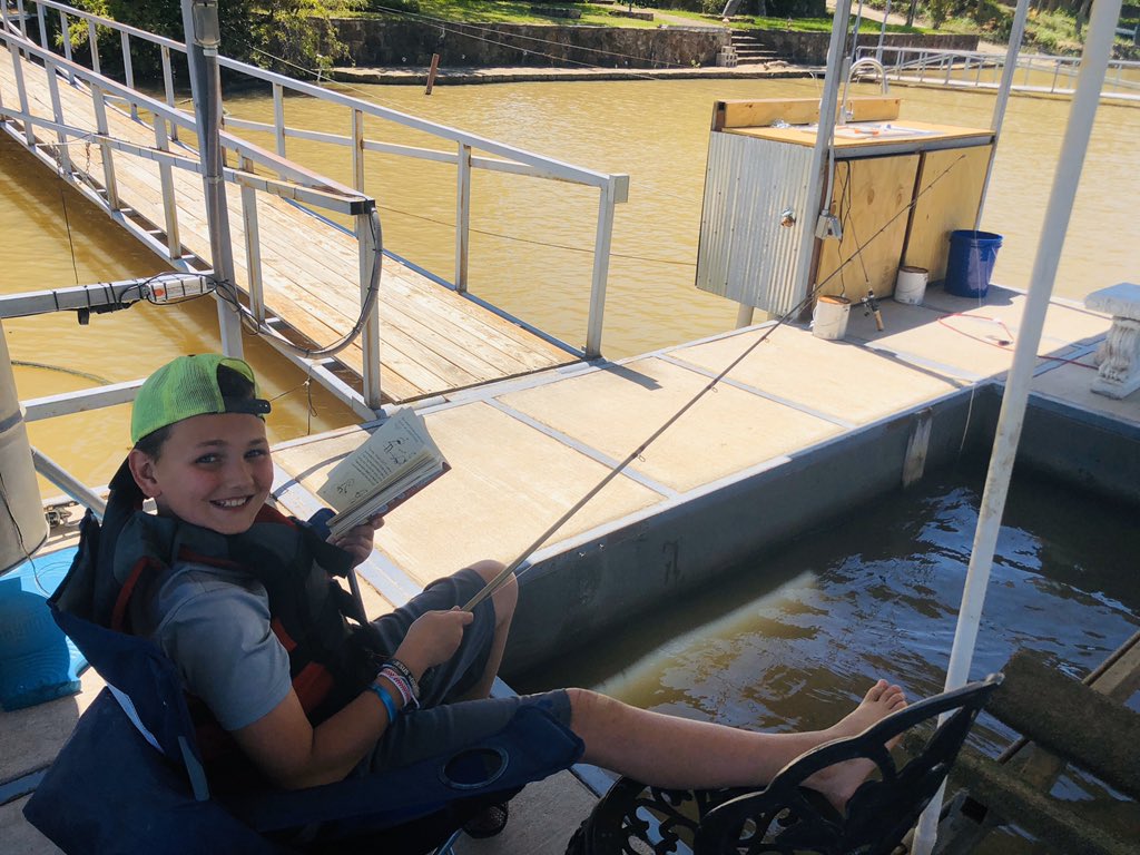 julie_seibold's tweet photo. The Seibold kids are doing great! Fisher loves to read while fishing, and Finley enjoys reading to pets and Zooming with her sweet kinder class! #Distantindisd @joseph_coburn @kimblase https://t.co/z2GUDs8pD7