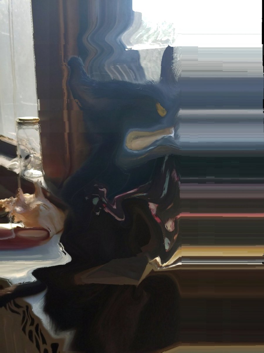 Tried taking photo of the cat(?) Earlier. Thought he was purring but now I'm not sure...