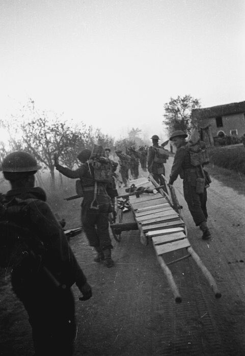  #OTD 75 years ago 2nd NZ Division cross Senio River at dusk and start of final push of Italian Campaign that would take them and granddad all the way to Trieste. (George Kaye’s photo of NZ soldiers with bridging equipment at dusk on 9 April 1945 DA-09133-F ATL)  #WW2  #Italy #NZ