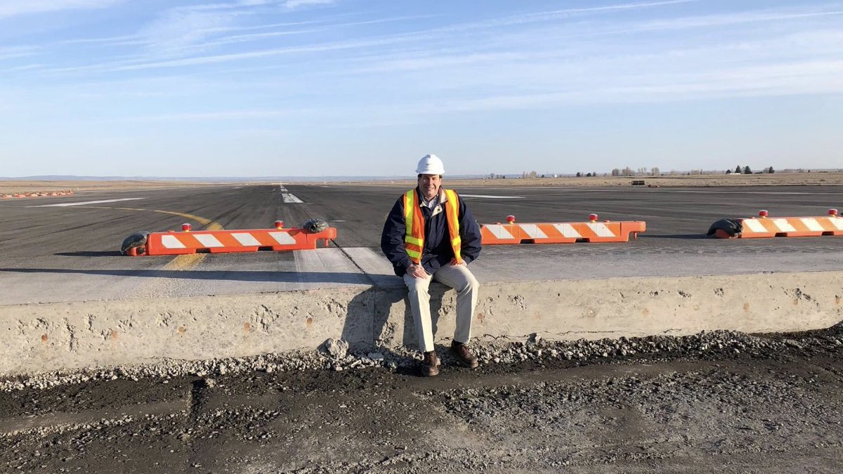 jetcitystar's tweet photo. UPDATE: The @PORTOFMOSESLAKE has passed the midpoint on the main runway project &amp; Granite Construction is building the new, lower base for the 3,500 ft section that starts north of the runway intersection. Airfield Director, Rich Mueller is depicting the thickness of the runway. https://t.co/Qc0YWn8ryU