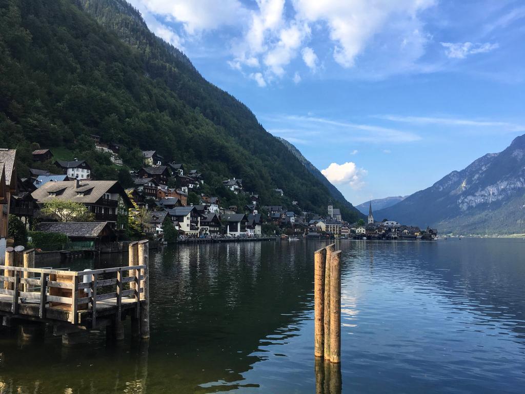 Day eight of #AlphabetAdventures is the letter 'H,' so here's the stunning Austrian town of Hallstatt. If arriving by train, you then take a boat across the river to the town. It's magical! 💙